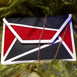 Color block faux leather red white and black purse 8 x tall 12 in tall. Not wide